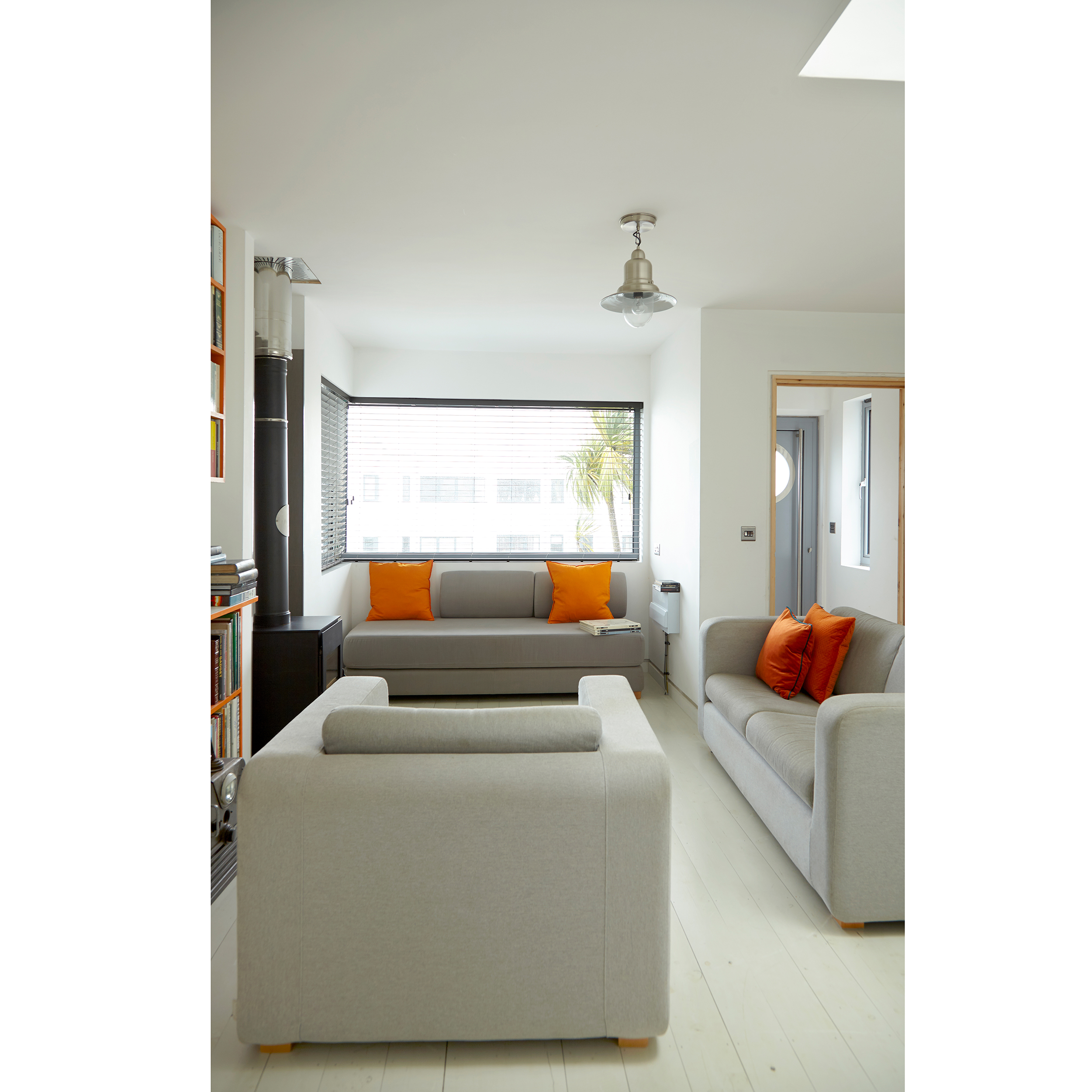 Interior photo of sitting room with view through window